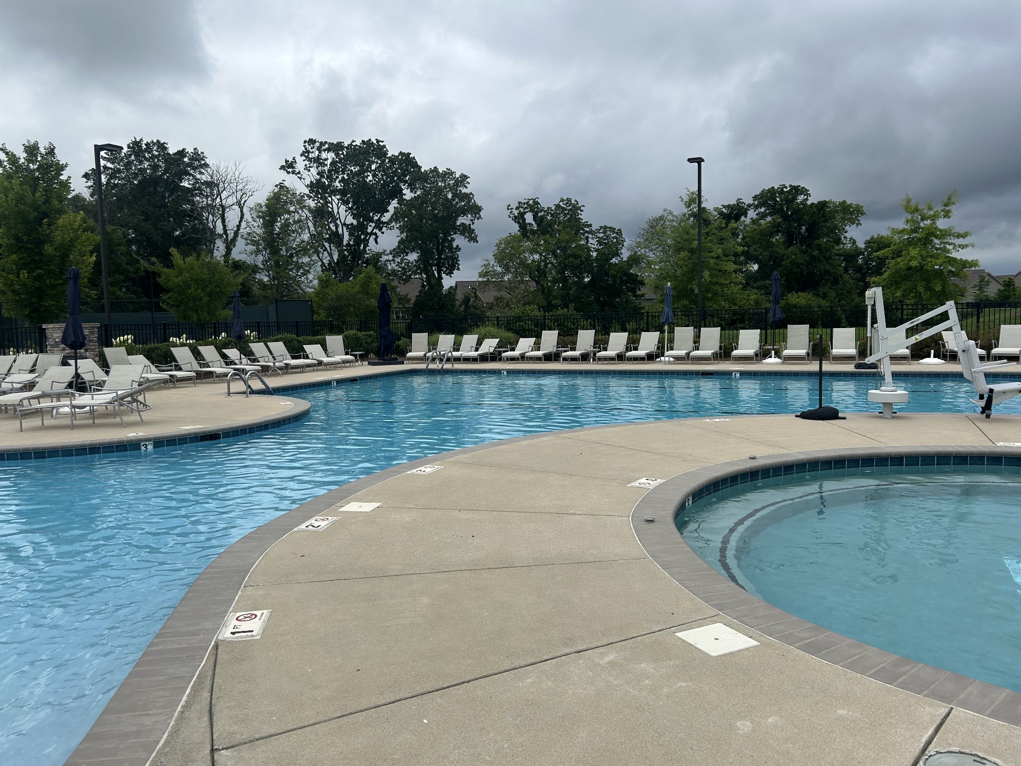 1084 Sumner Grove Spring Hill, TN 37174 - Photo 40 of 40 a view of a swimming pool with a lake