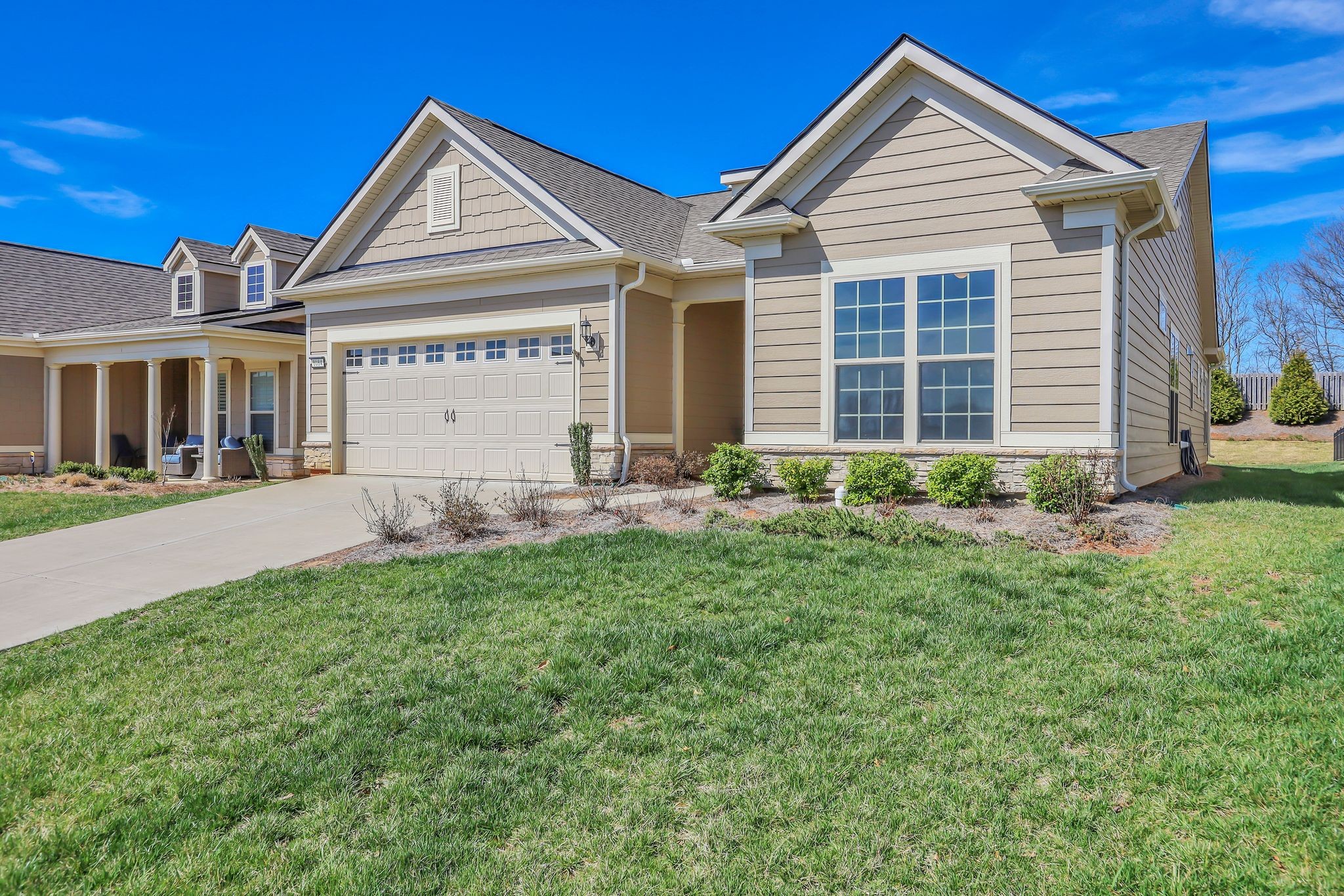 1084 Sumner Grove Spring Hill, TN 37174 - Photo 4 of 40 a view of a house with a yard