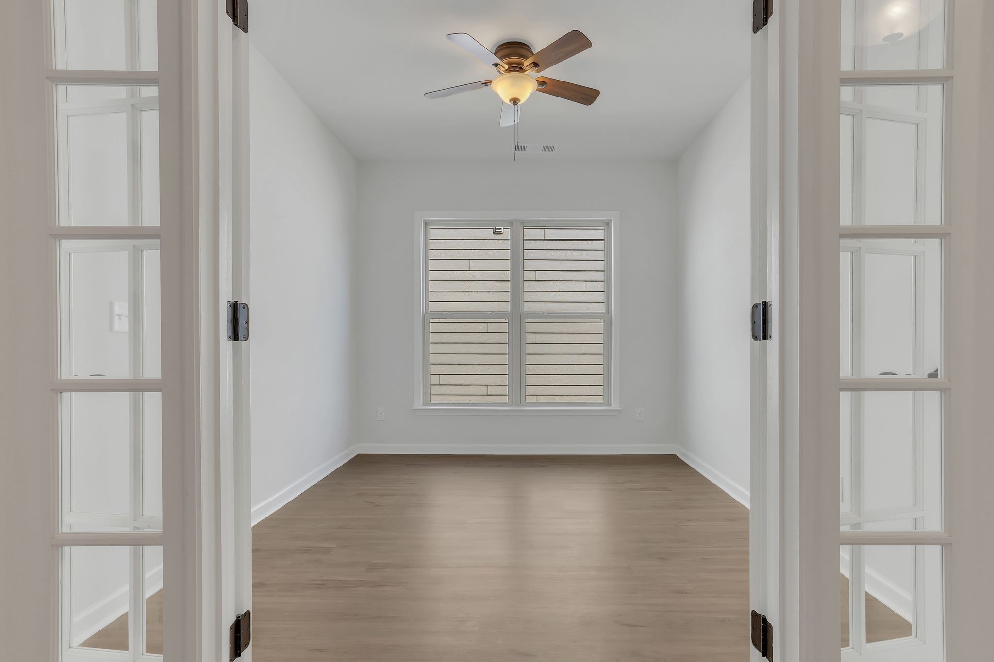 1084 Sumner Grove Spring Hill, TN 37174 - Photo 6 of 40 a view of an empty room with a window