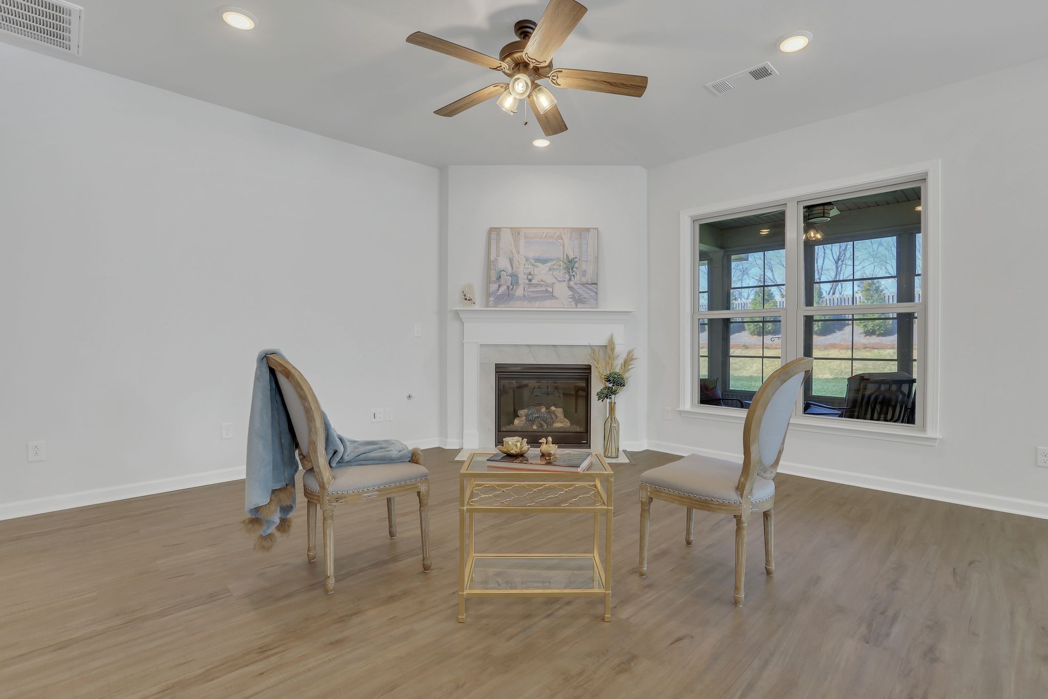 1084 Sumner Grove Spring Hill, TN 37174 - Photo 10 of 40 a living room with furniture and a fireplace