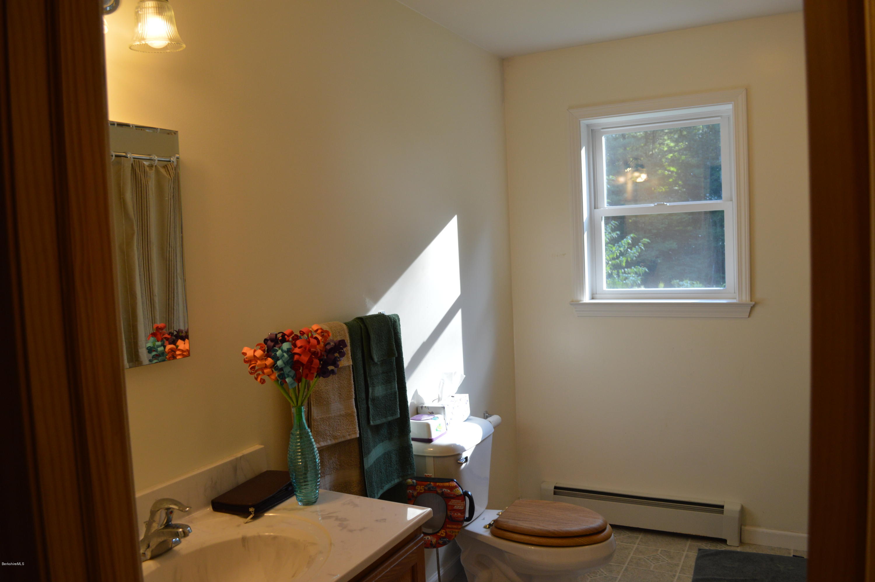 753 Upper Valley Road Washington, MA 01223 - Photo 2 of 32 a bathroom with a sink toilet and shower