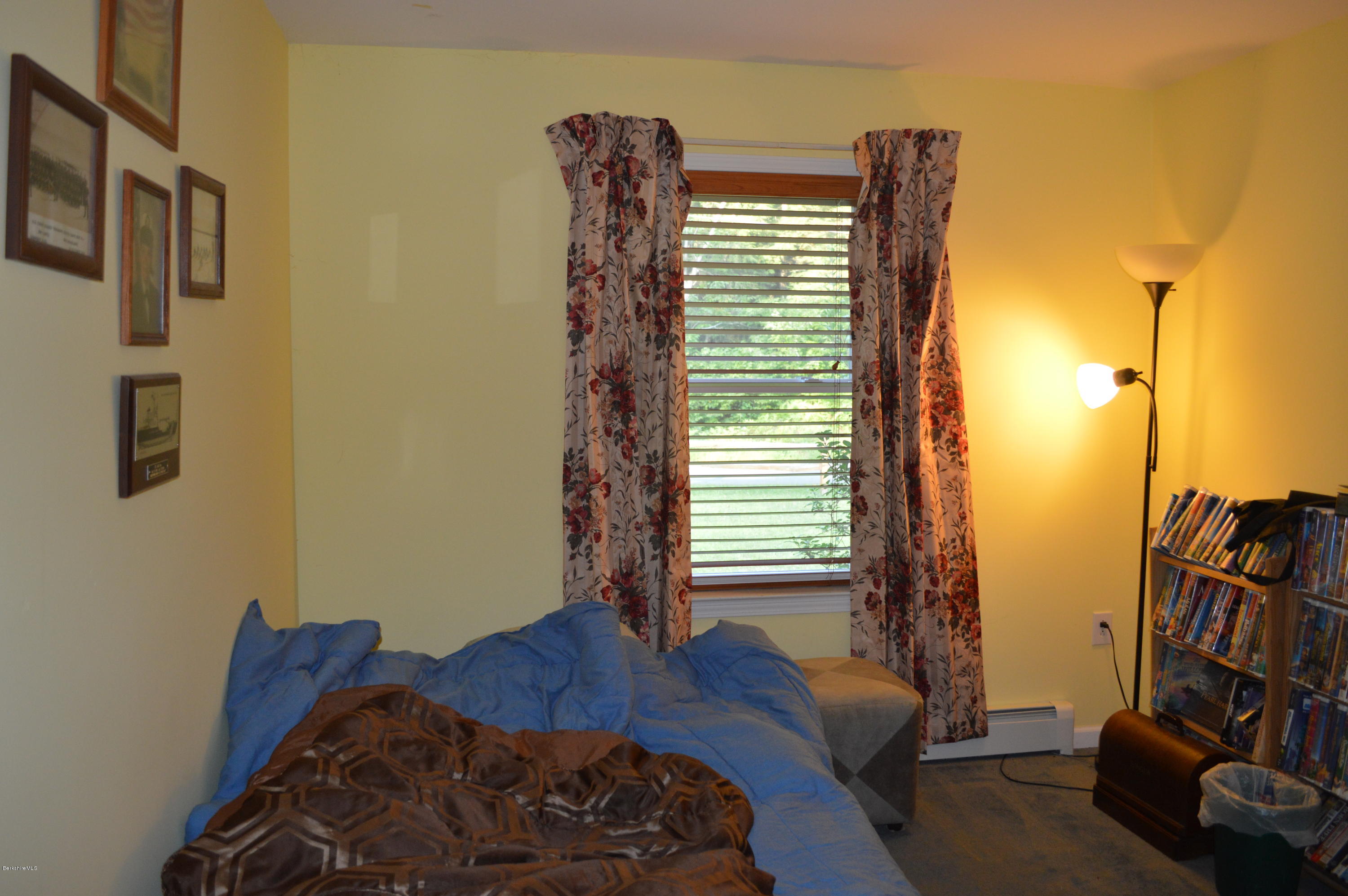 753 Upper Valley Road Washington, MA 01223 - Photo 19 of 32 a bedroom with a bed and a closet
