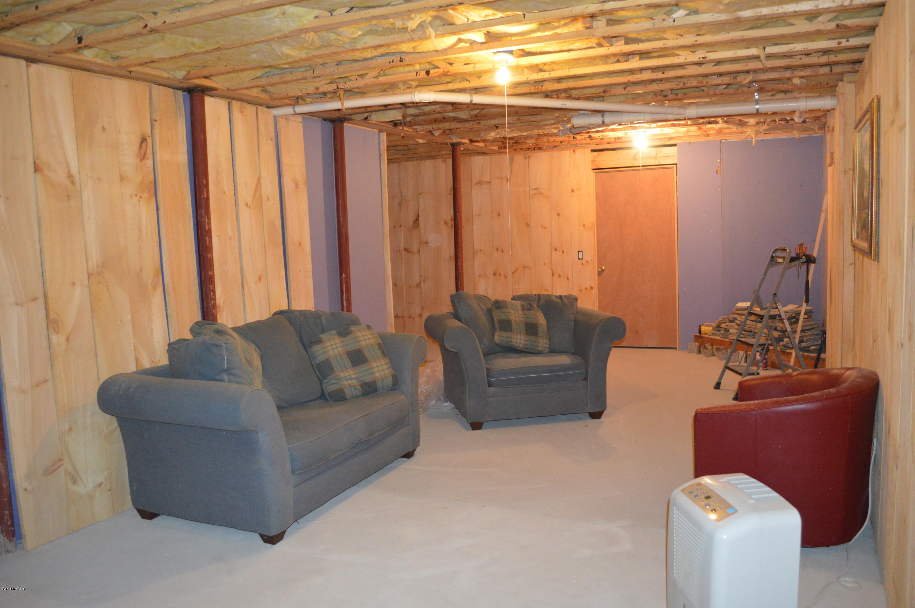 753 Upper Valley Road Washington, MA 01223 - Photo 4 of 32 a living room with furniture and a large window