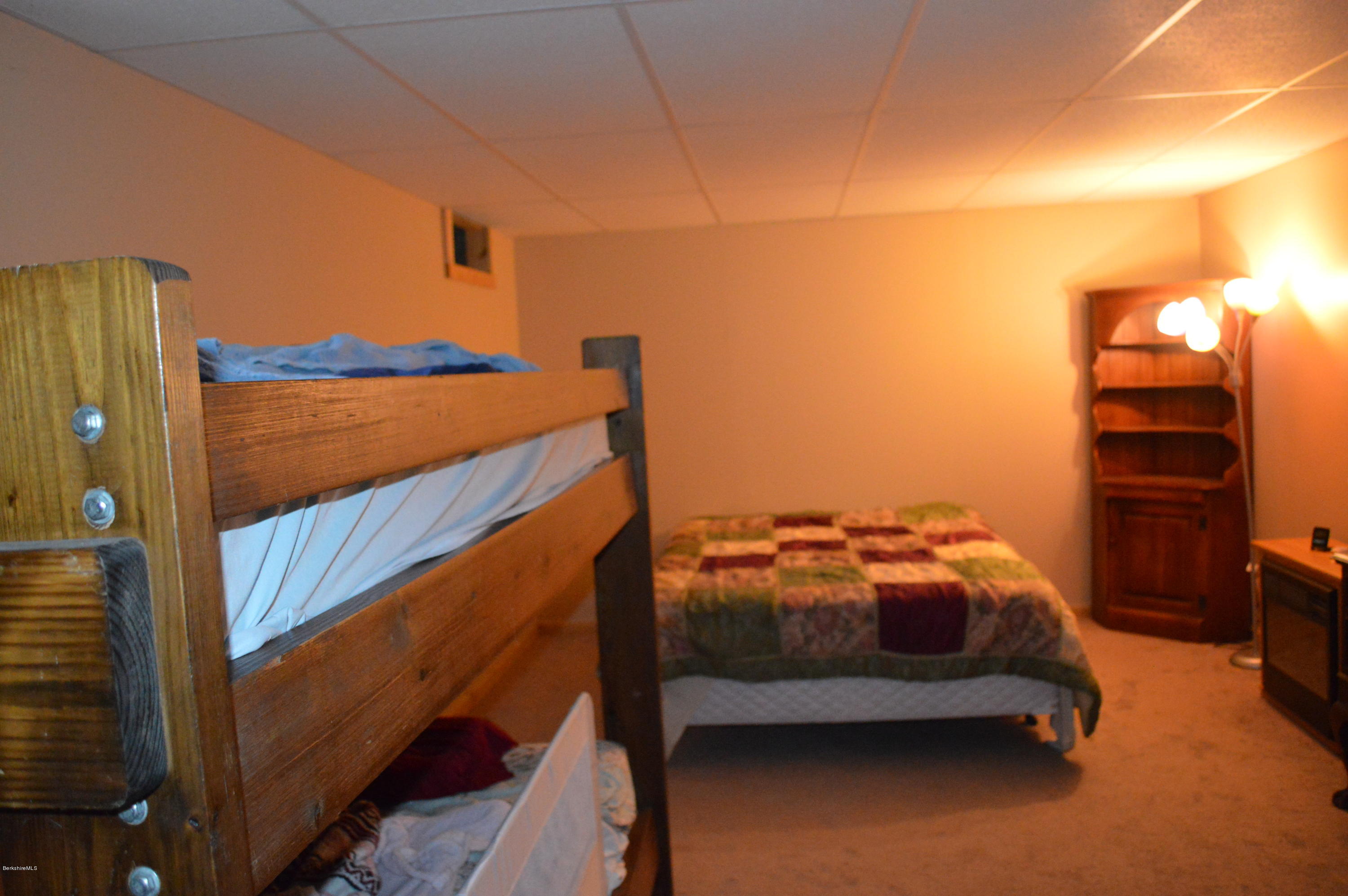 753 Upper Valley Road Washington, MA 01223 - Photo 6 of 32 a bedroom with a bunk bed
