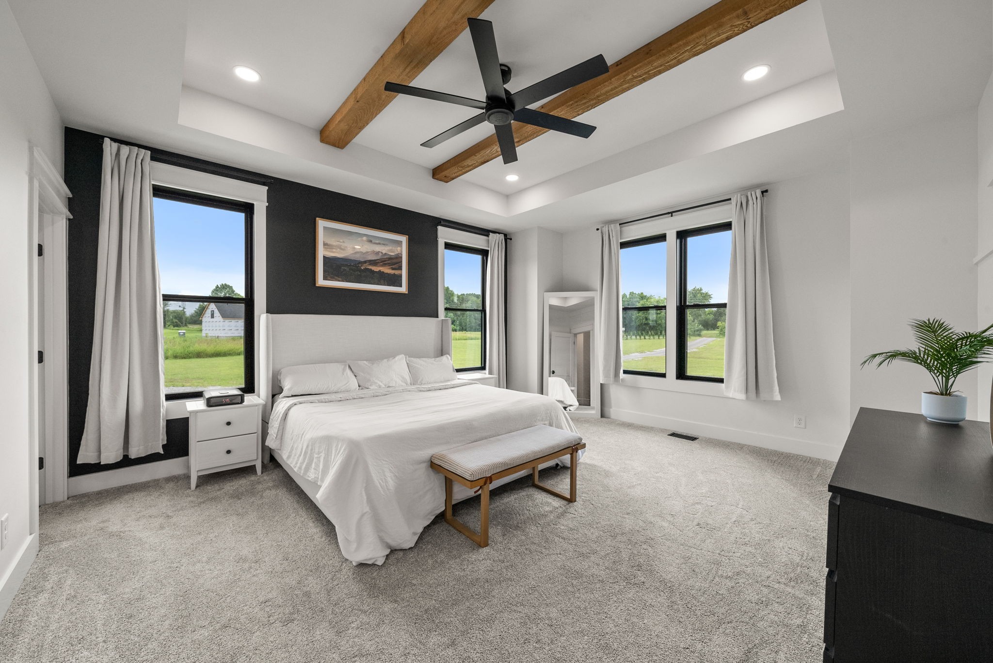 5183 Sango Road Clarksville, TN 37043 - Photo 42 of 84 a spacious bedroom with a bed window and a table