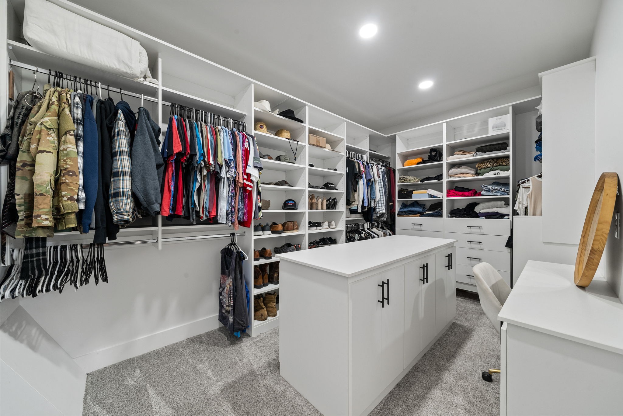 5183 Sango Road Clarksville, TN 37043 - Photo 52 of 84 a view of walk in closet with clothes and shoes