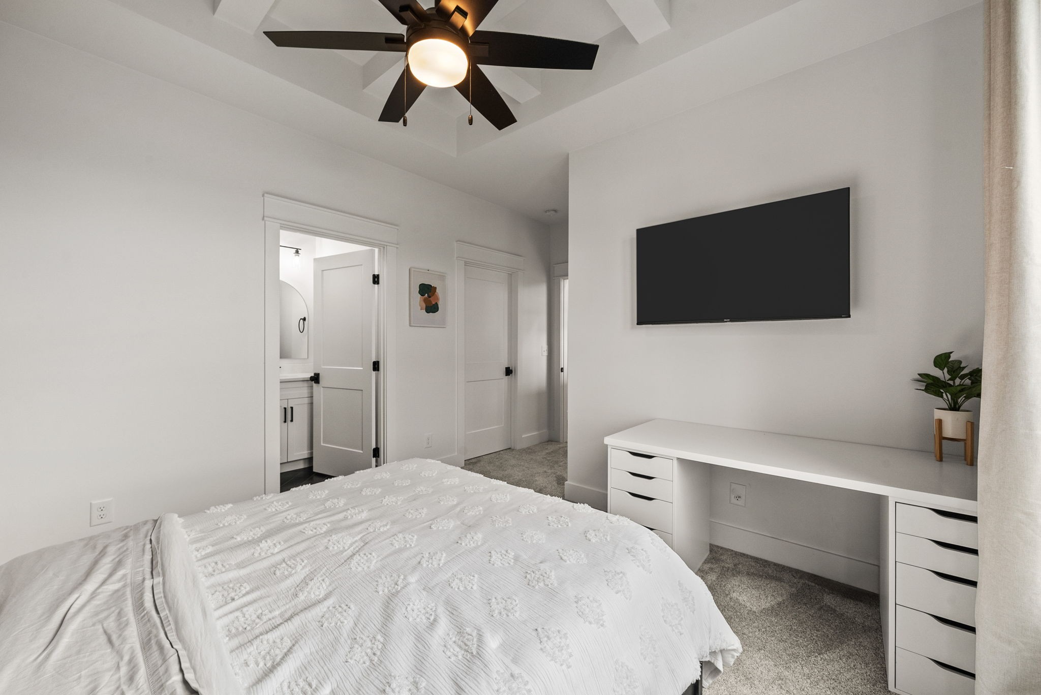 5183 Sango Road Clarksville, TN 37043 - Photo 54 of 84 a bedroom with a bed and a flat screen tv