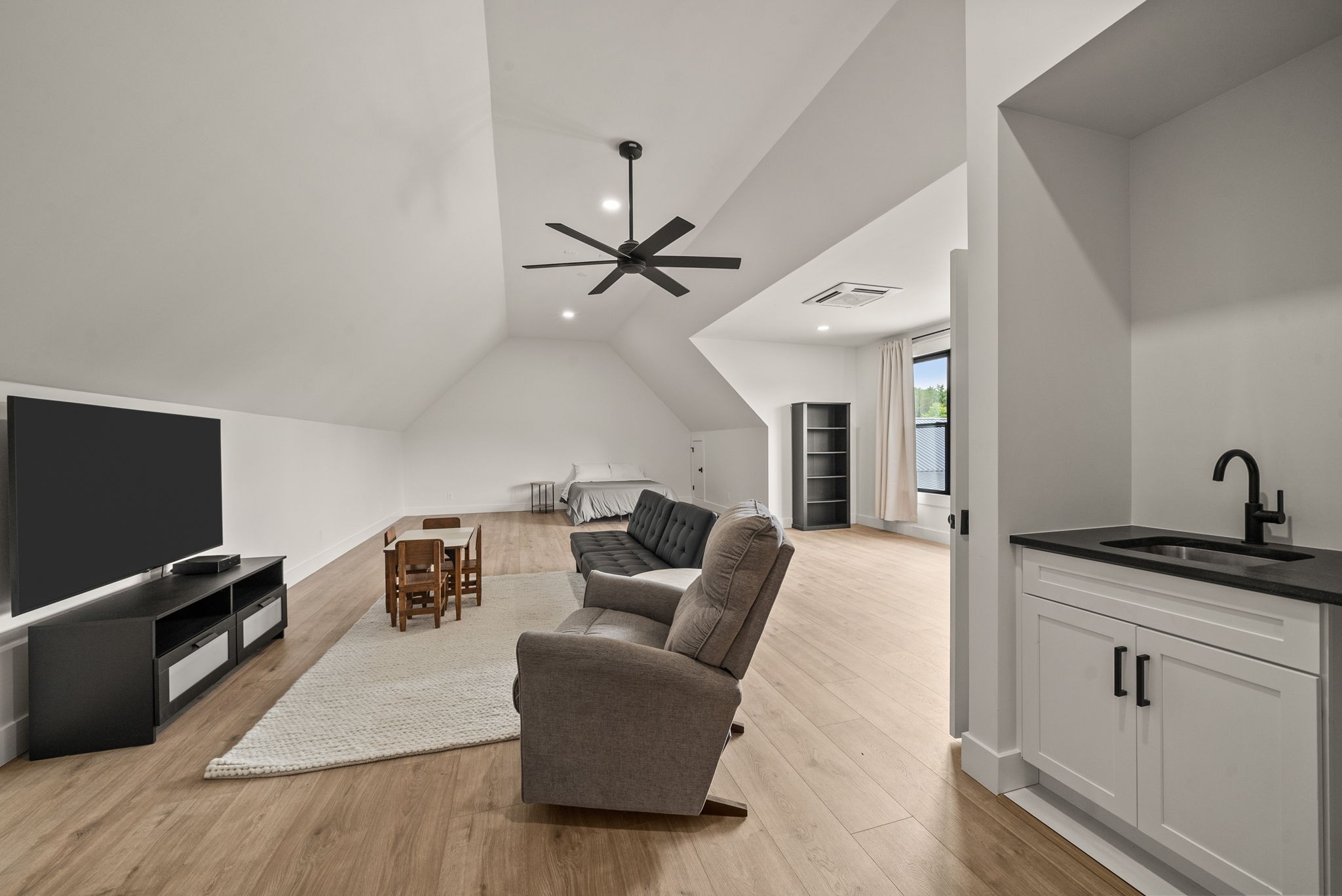 5183 Sango Road Clarksville, TN 37043 - Photo 64 of 84 a living room with furniture and a flat screen tv