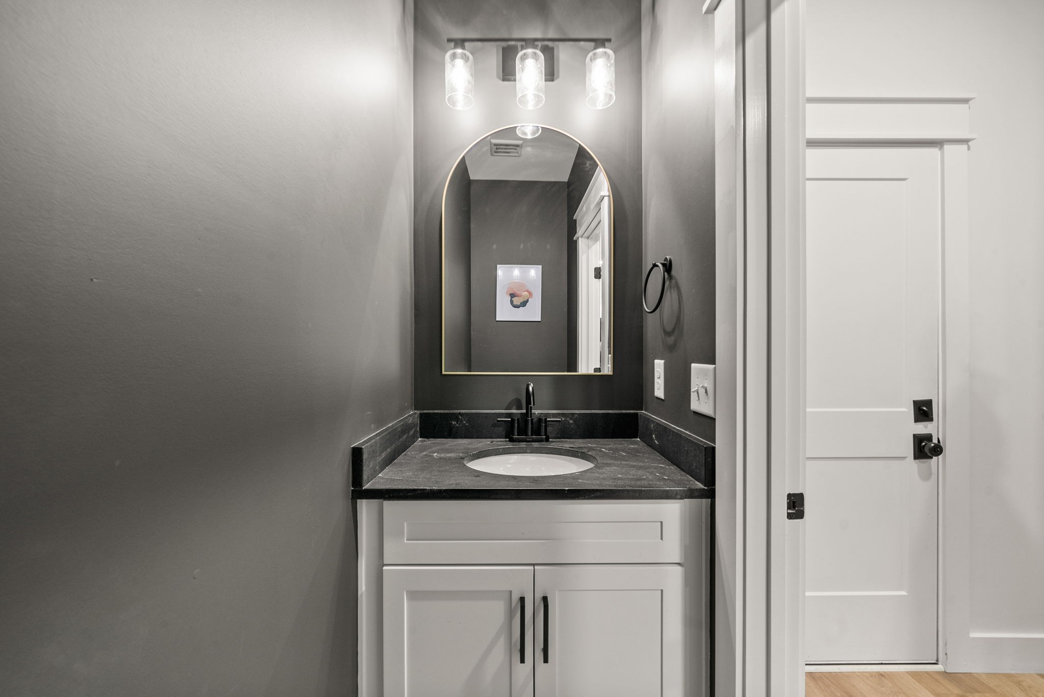 5183 Sango Road Clarksville, TN 37043 - Photo 68 of 84 a bathroom with a granite countertop sink a toilet and a mirror
