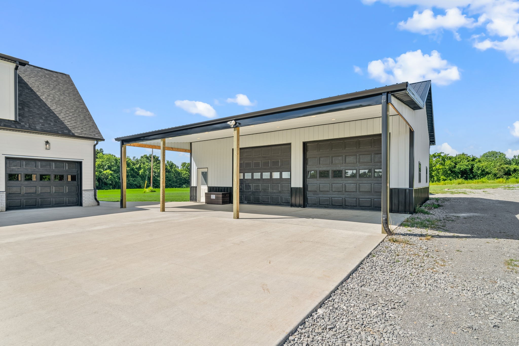 5183 Sango Road Clarksville, TN 37043 - Photo 70 of 84 a view of a house with a yard and garage