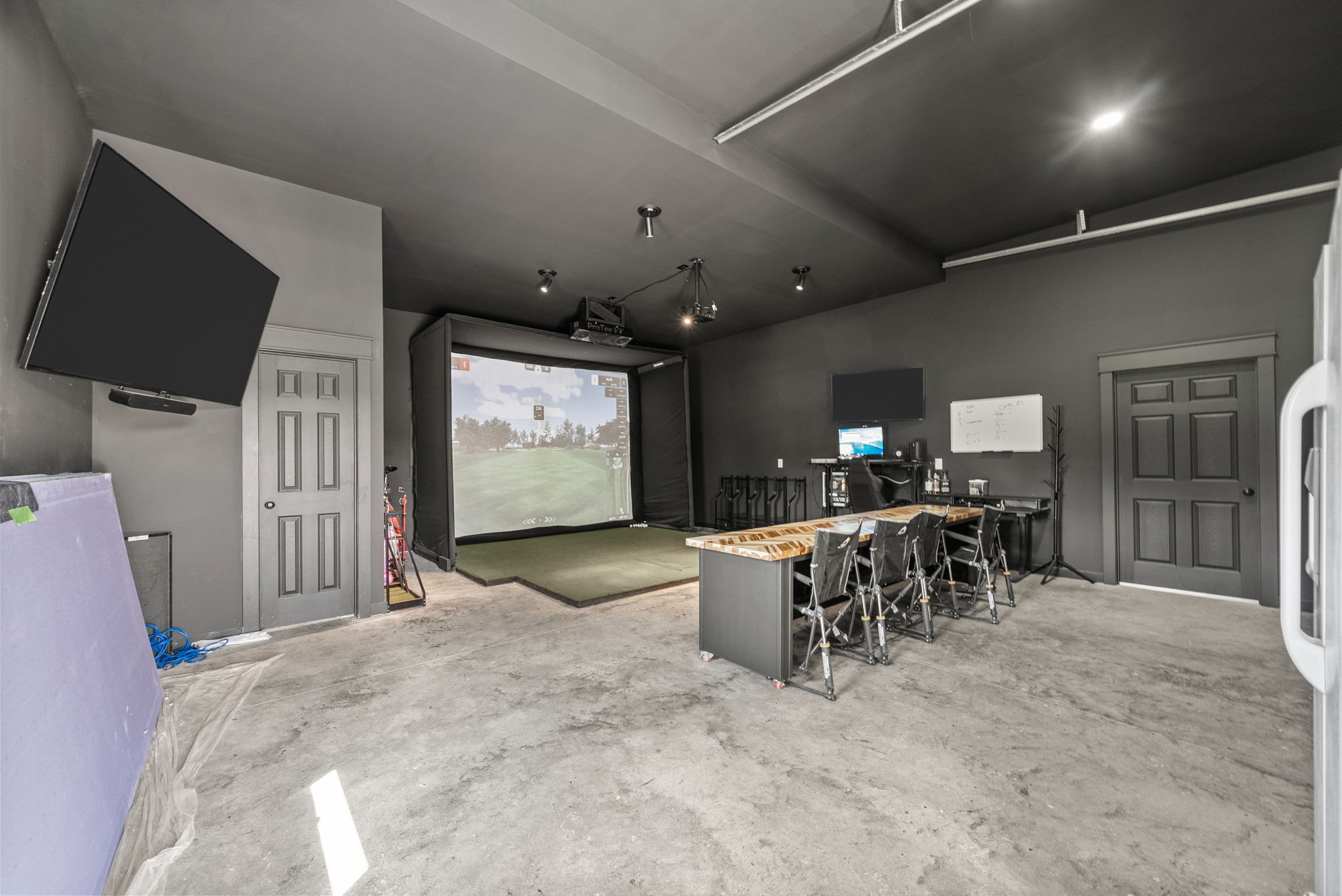 5183 Sango Road Clarksville, TN 37043 - Photo 73 of 84 a view of a projector room with furniture and a flat screen tv