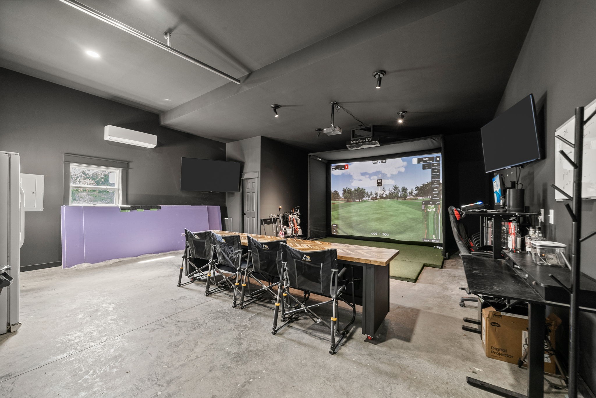 5183 Sango Road Clarksville, TN 37043 - Photo 74 of 84 a room with gym equipment and a flat screen tv
