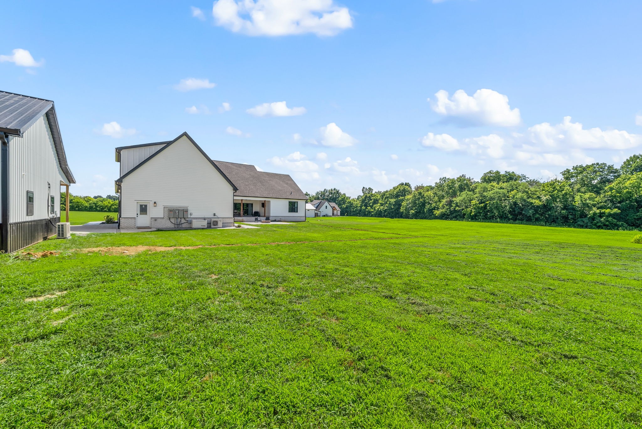 5183 Sango Road Clarksville, TN 37043 - Photo 78 of 84 a view of a house with backyard and garden