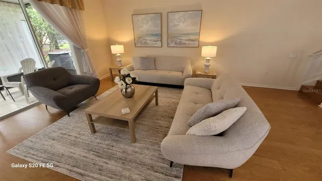 a living room with furniture and a couch