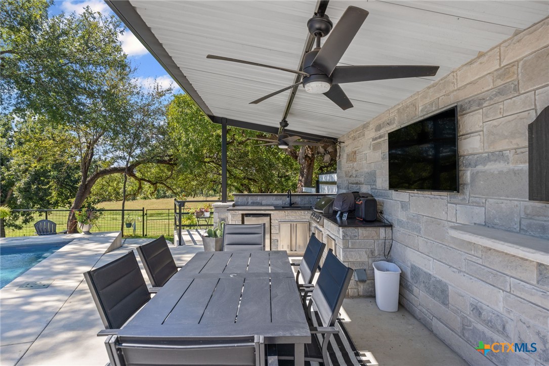 28099 Fm 2670 Killeen, TX 76549 - Photo 29 of 48 a outdoor space with chairs a flat screen tv