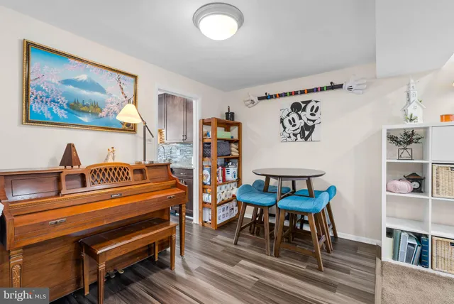 a view of a livingroom with furniture and lounge chair