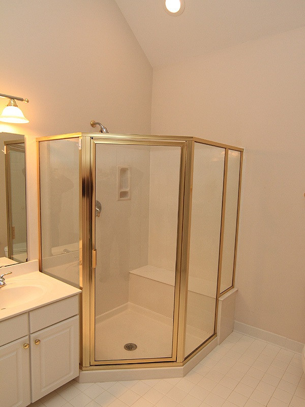 2937 Sunnystone Way Raleigh, NC 27613 - Photo 17 of 25 Enjoy the large Shower with a large ceramic bench for sitting. Master Shower