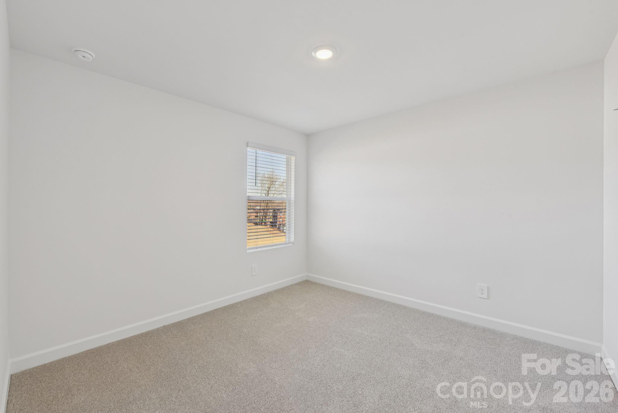 164 Murphy Mdw Road Mocksville, NC 27028 - Photo 7 of 12 an empty room with a window
