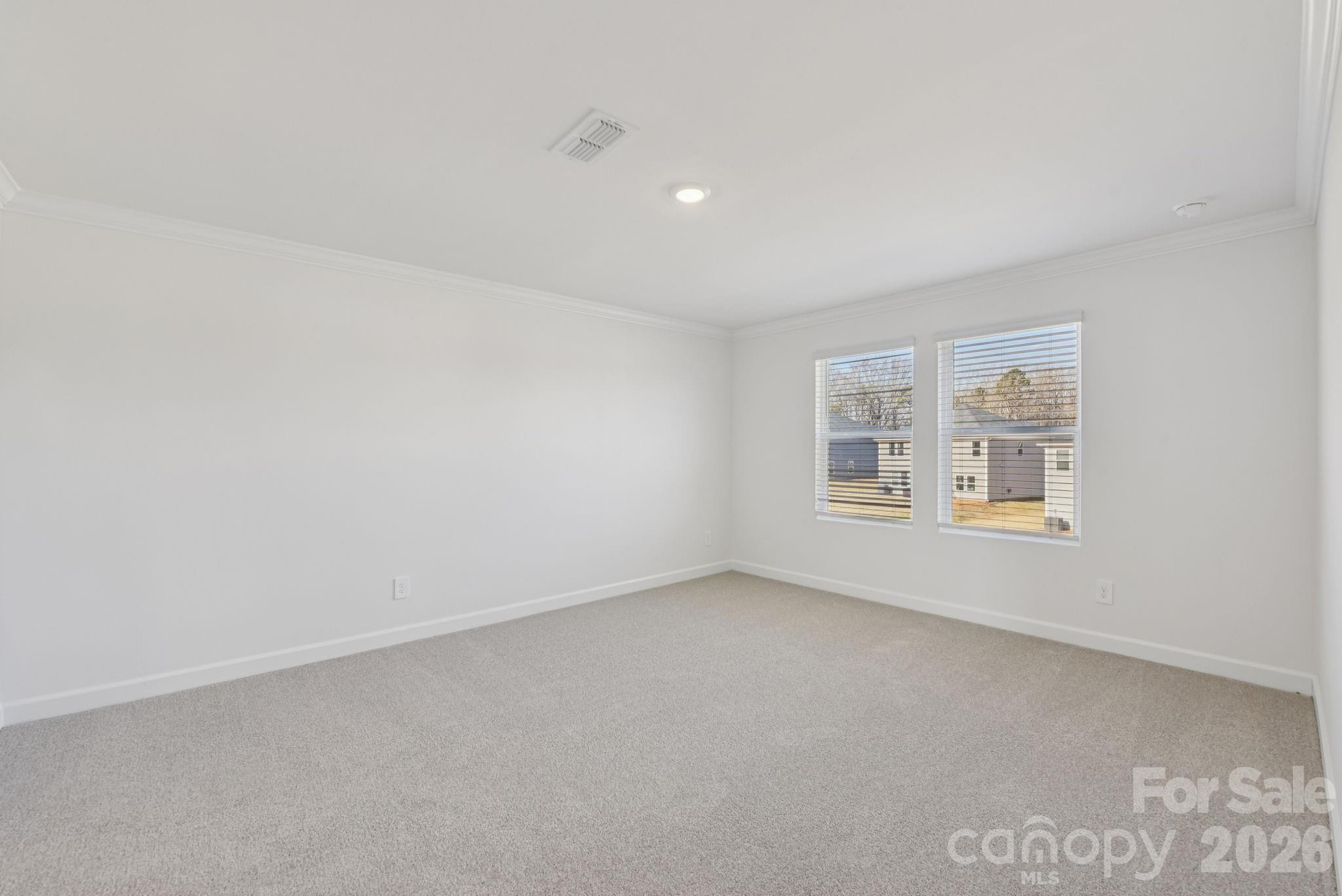 164 Murphy Mdw Road Mocksville, NC 27028 - Photo 8 of 12 an empty room with a empty space and window