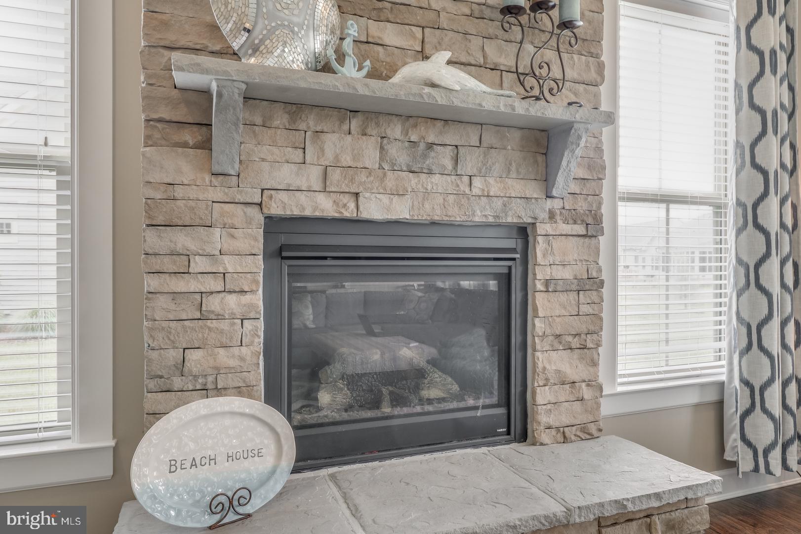 25372 Robin Tree Lane Ocean View, DE 19970 - Photo 33 of 61 Floor to Ceiling Stone Fireplace-What a statement