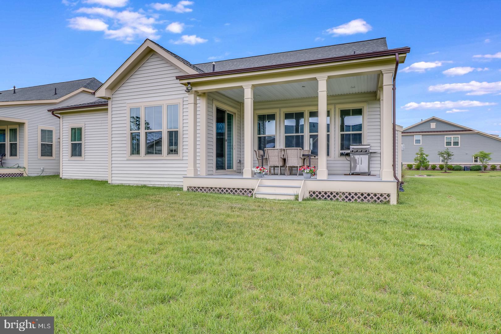25372 Robin Tree Lane Ocean View, DE 19970 - Photo 37 of 61 Covered Rear Porch