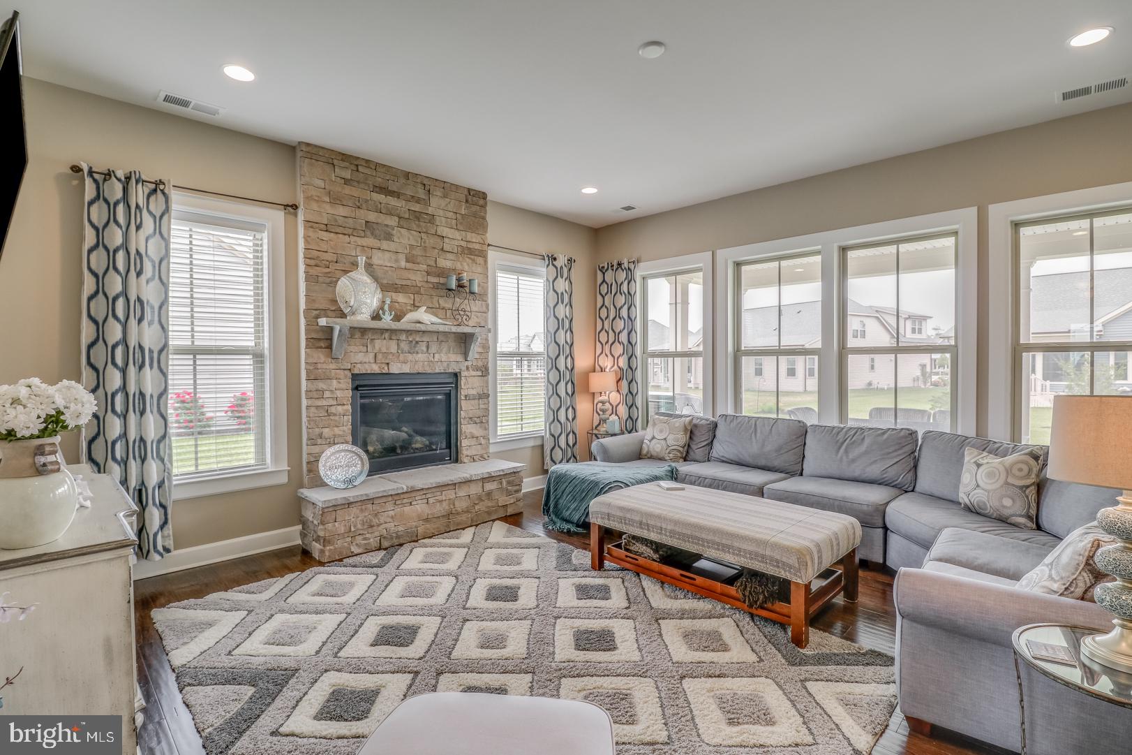 25372 Robin Tree Lane Ocean View, DE 19970 - Photo 7 of 61 Large Family Room w/Focal Stone Fireplace