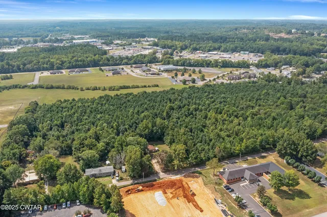 a view of a city with an ocean view