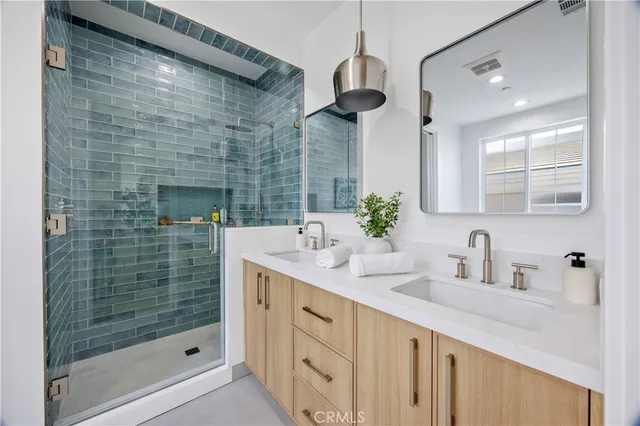 a white bath tub sitting next to a white toilet