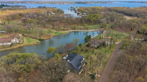 a view of a lake with a building in the background