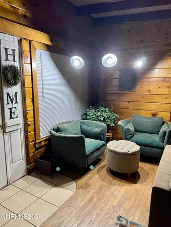 a view of a room with wooden walls