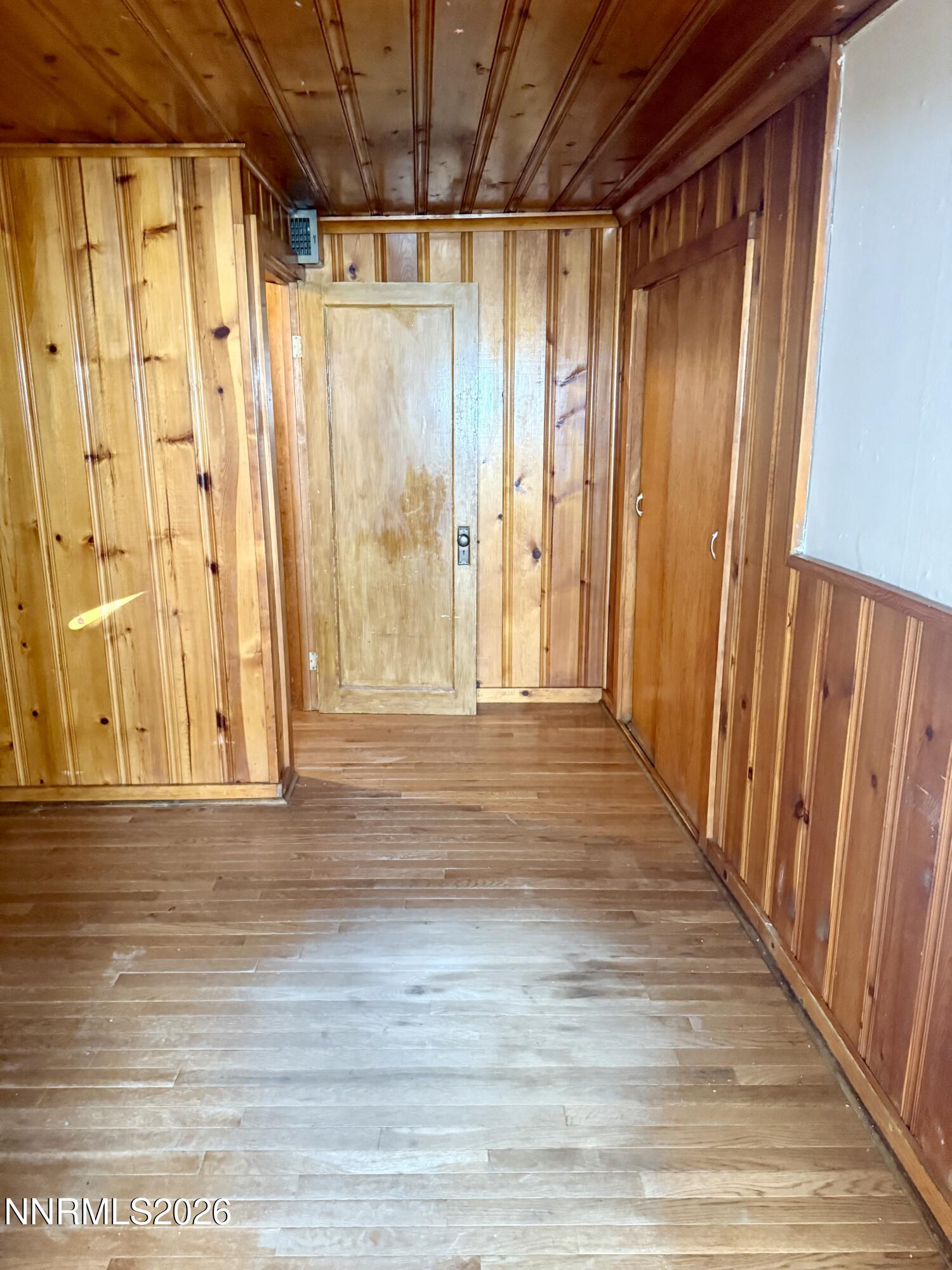 745 West Center Street Fallon, NV 89406 - Photo 12 of 23 a view of a room with wooden walls