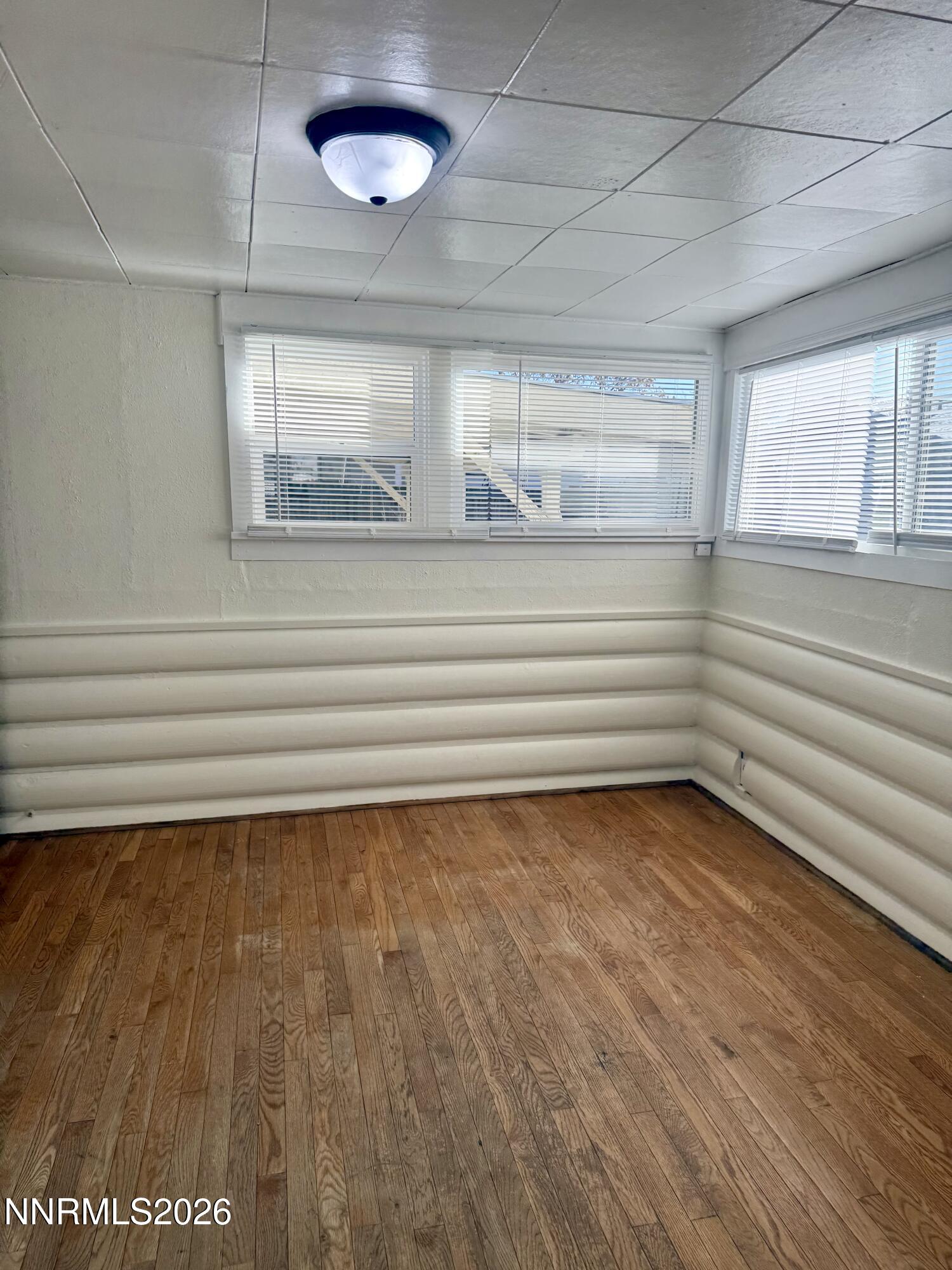 745 West Center Street Fallon, NV 89406 - Photo 13 of 23 a view of lot of window and wooden floor