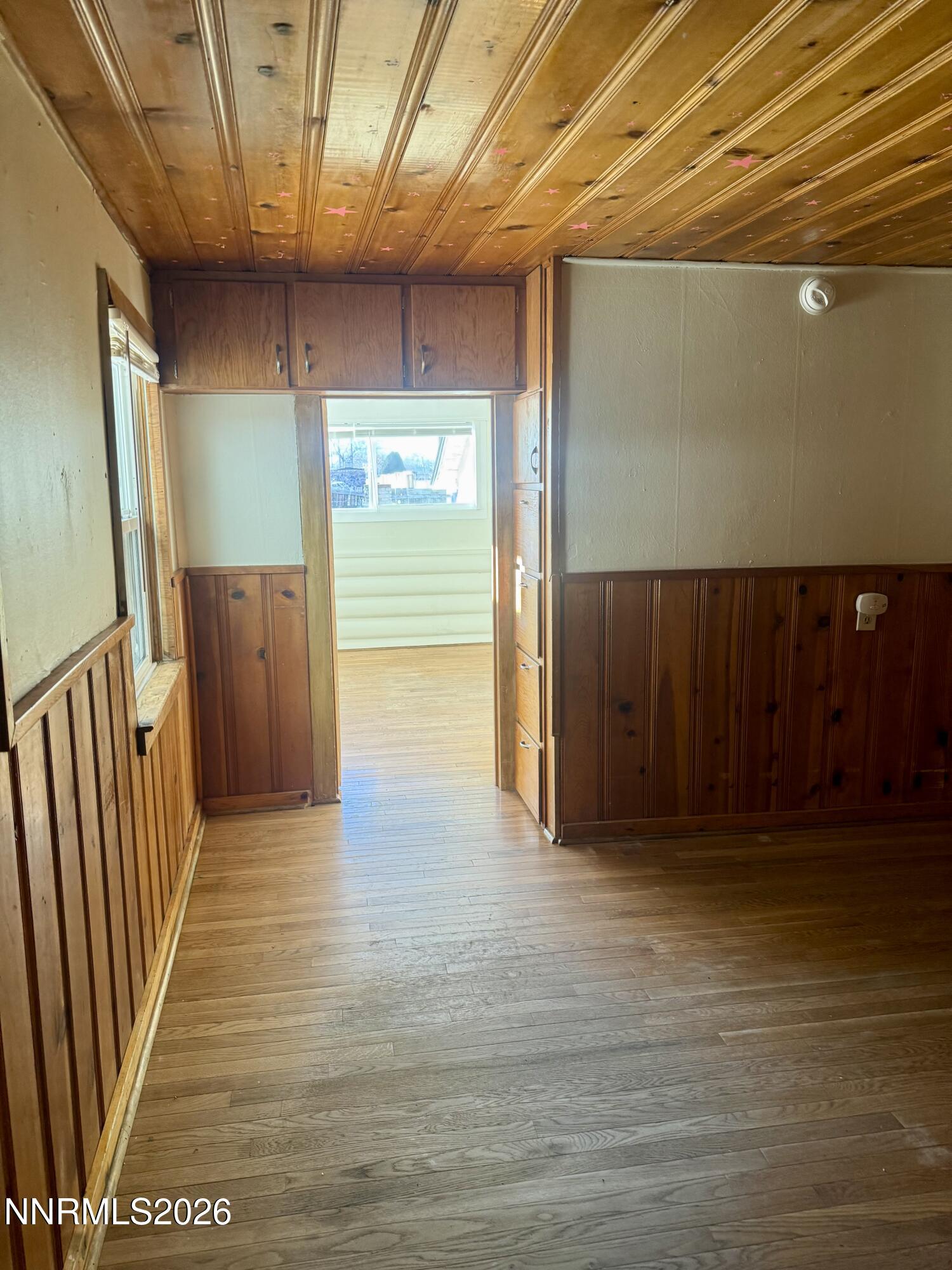 745 West Center Street Fallon, NV 89406 - Photo 16 of 23 a view of a hallway with wooden floor