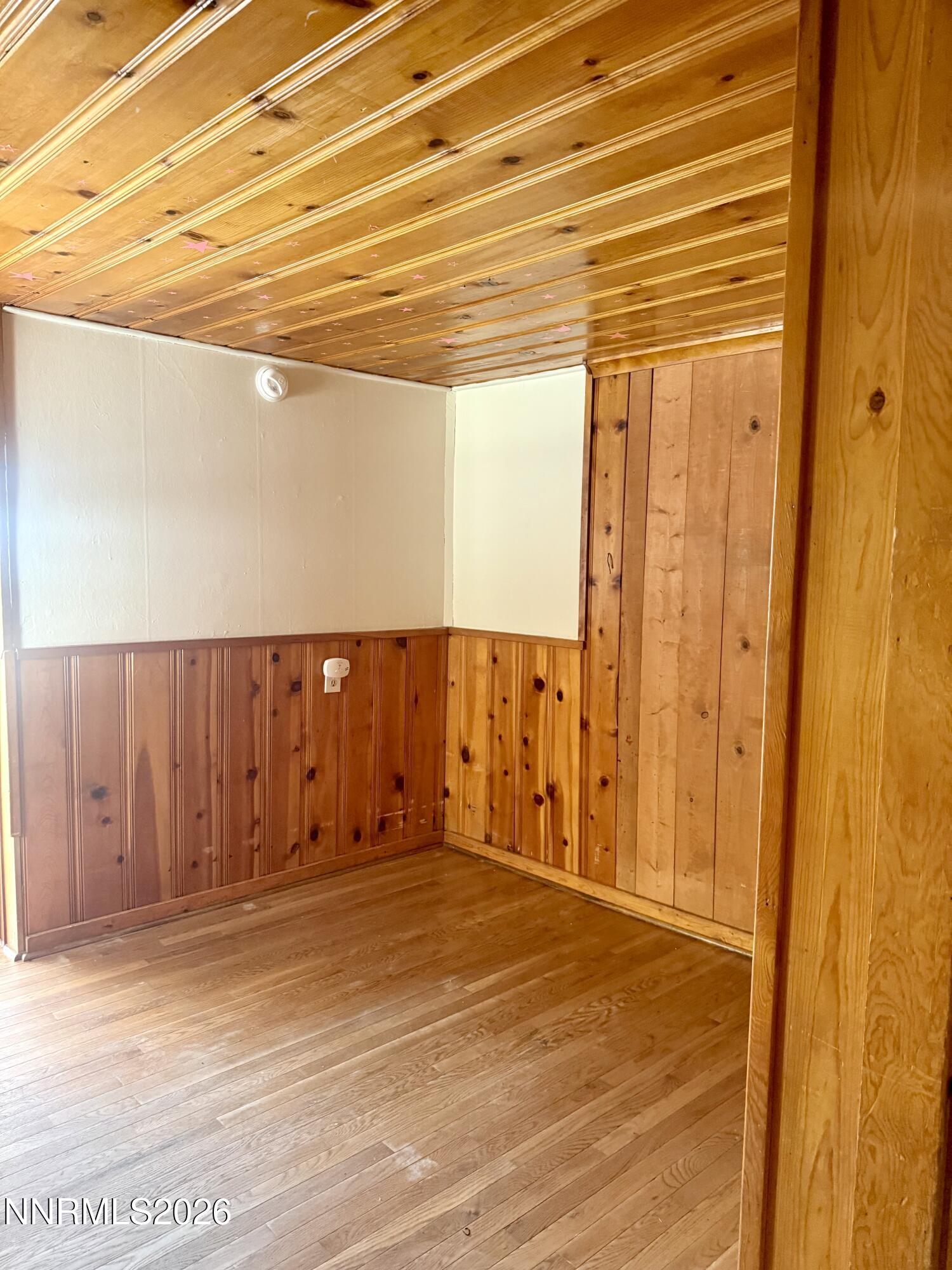 745 West Center Street Fallon, NV 89406 - Photo 17 of 23 a view of a room with wooden walls