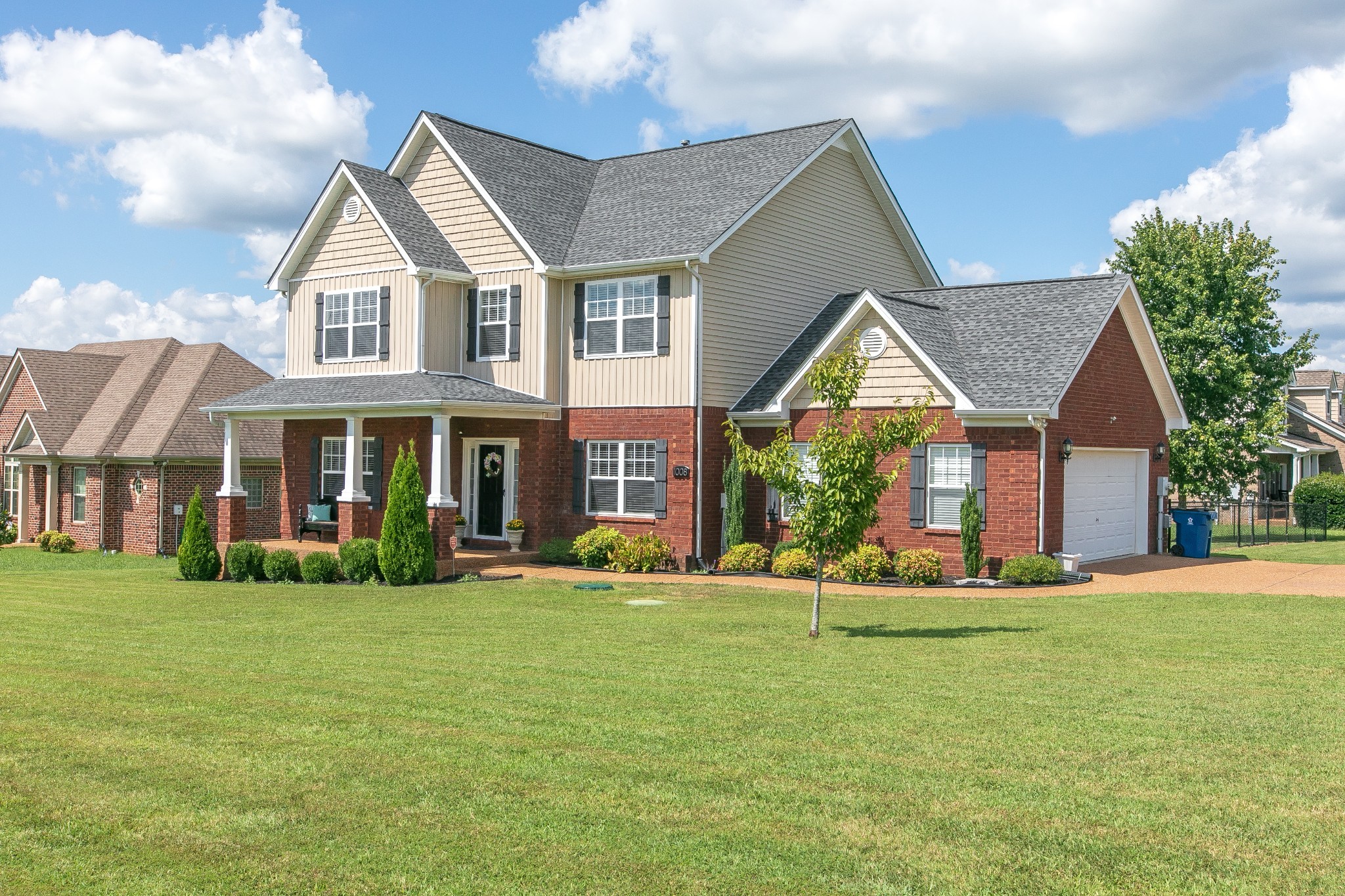 1008 Millstone Creek Road Lascassas, TN 37085 - Photo 1 of 42 a front view of brick house with a yard