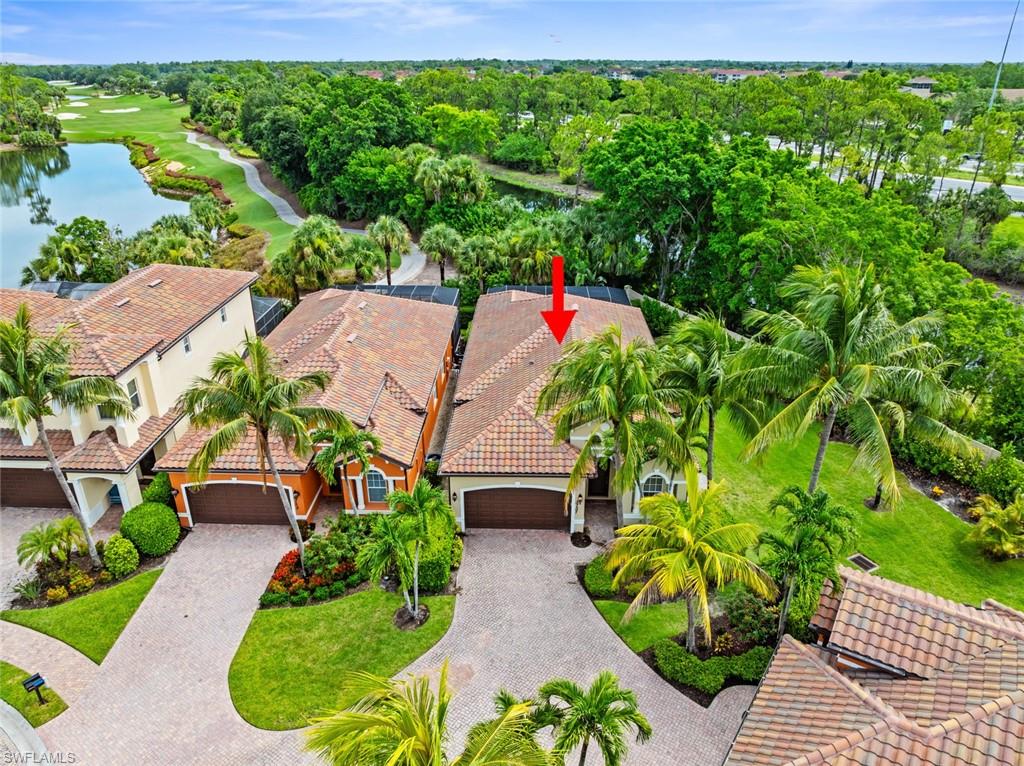 5757 Mango Circle Naples, FL 34110 - Photo 2 of 38 a aerial view of a house with a yard