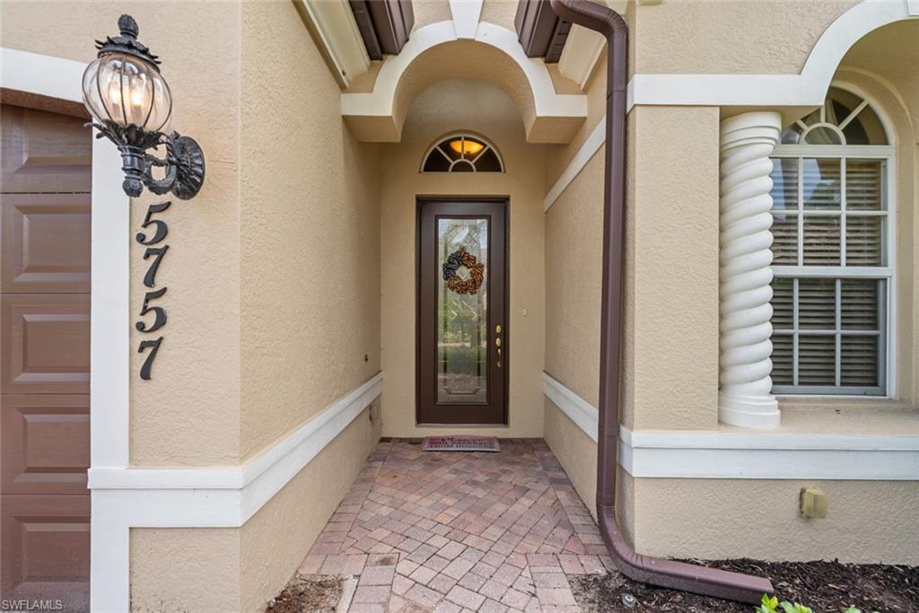 5757 Mango Circle Naples, FL 34110 - Photo 25 of 38 a view of entryway with a front door