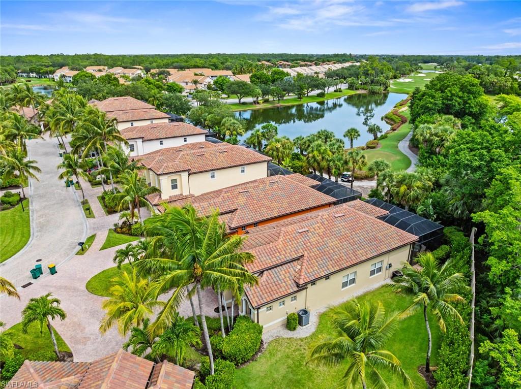5757 Mango Circle Naples, FL 34110 - Photo 32 of 38 an aerial view of residential houses with outdoor space