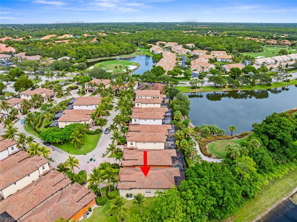 5757 Mango Circle Naples, FL 34110 - Photo 37 of 38 an aerial view of residential houses with outdoor space and trees