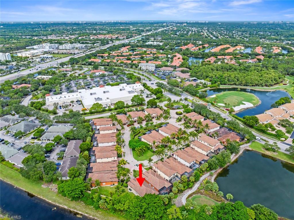 5757 Mango Circle Naples, FL 34110 - Photo 38 of 38 an aerial view of a city with lots of residential buildings