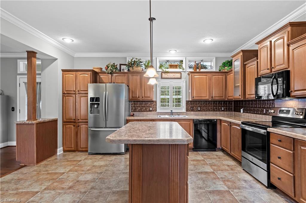 1607 Milling Road Mocksville, NC 27028 - Photo 19 of 38 Very well appointed kitchen with pantry and island.