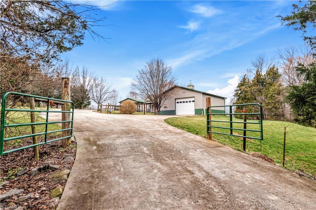 1607 Milling Road Mocksville, NC 27028 - Photo 2 of 38 Up the driveway to see this beauty!