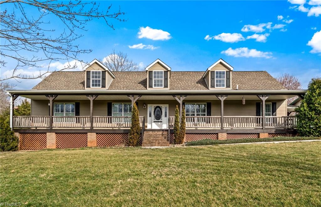 1607 Milling Road Mocksville, NC 27028 - Photo 3 of 38 Come sit on the front porch and look at this beautiful acreage.