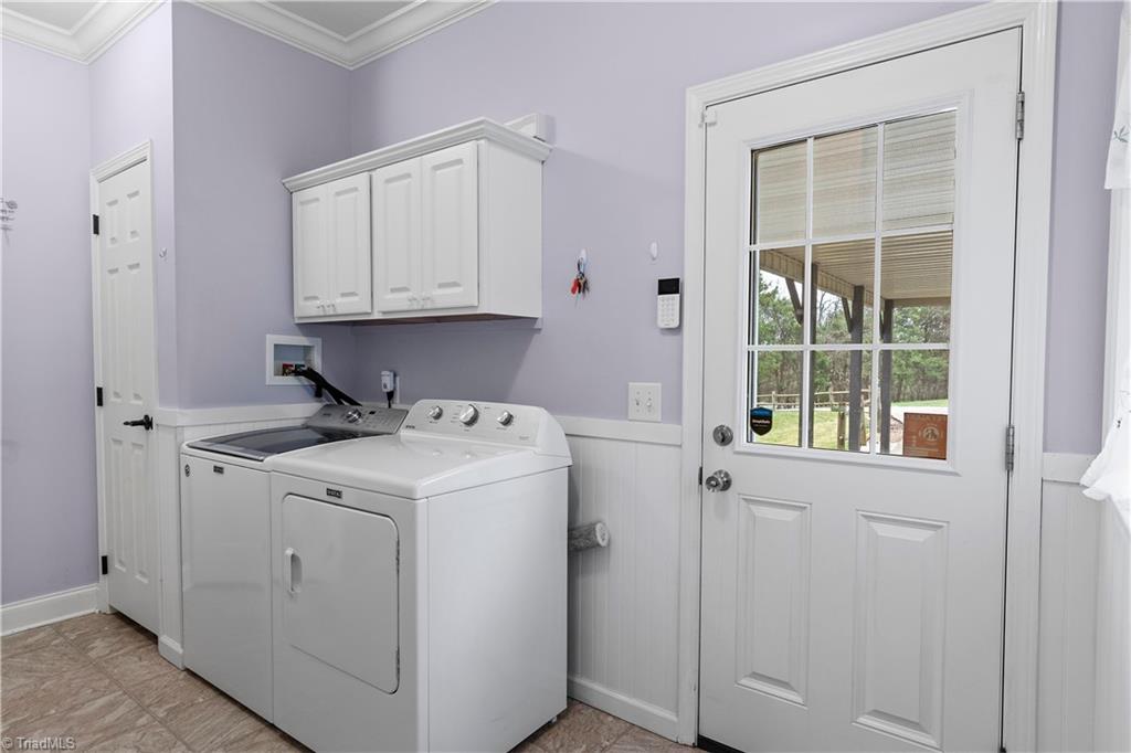 1607 Milling Road Mocksville, NC 27028 - Photo 31 of 38 Laundry area/mud room. Washer and dryer remain.
