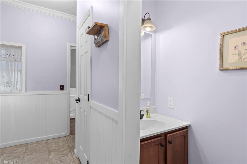 1607 Milling Road Mocksville, NC 27028 - Photo 32 of 38 Half bath near laundry room.