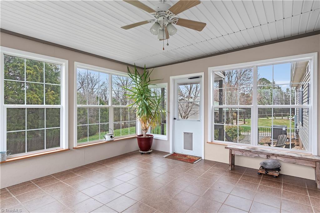 1607 Milling Road Mocksville, NC 27028 - Photo 33 of 38 Screened porch on back of home.