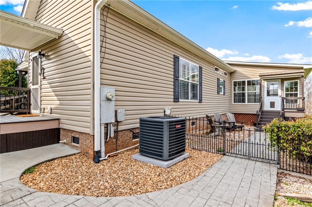 1607 Milling Road Mocksville, NC 27028 - Photo 7 of 38 Screened porch on back of home.