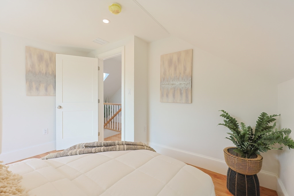 179 B Main Street, Unit B Medford, MA 02155 - Photo 14 of 40 a bathroom with a potted plant and a shower