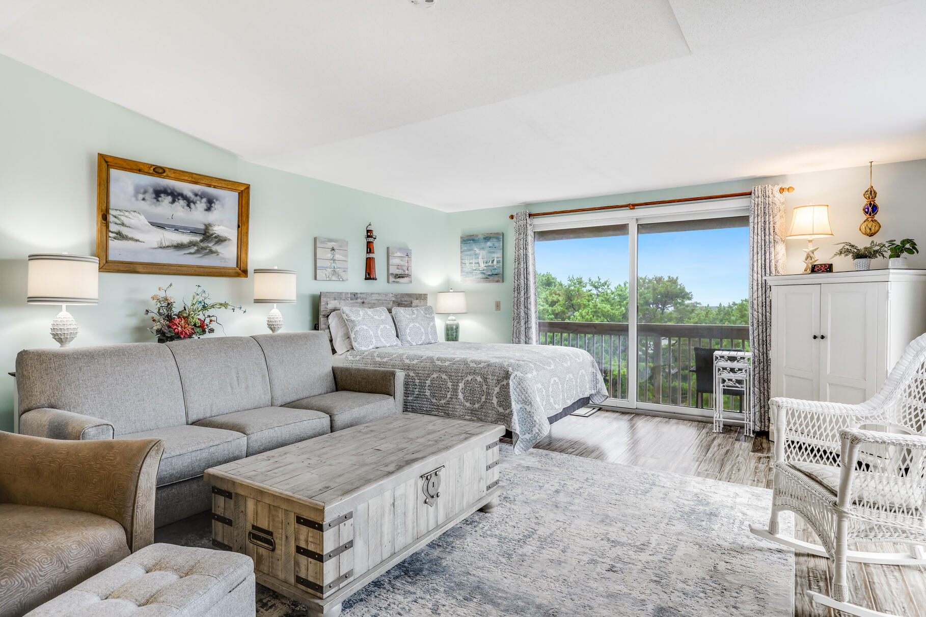 132 Shore Road, Unit 30 Truro, MA 02666 - Photo 2 of 32 a living room with furniture and a large window