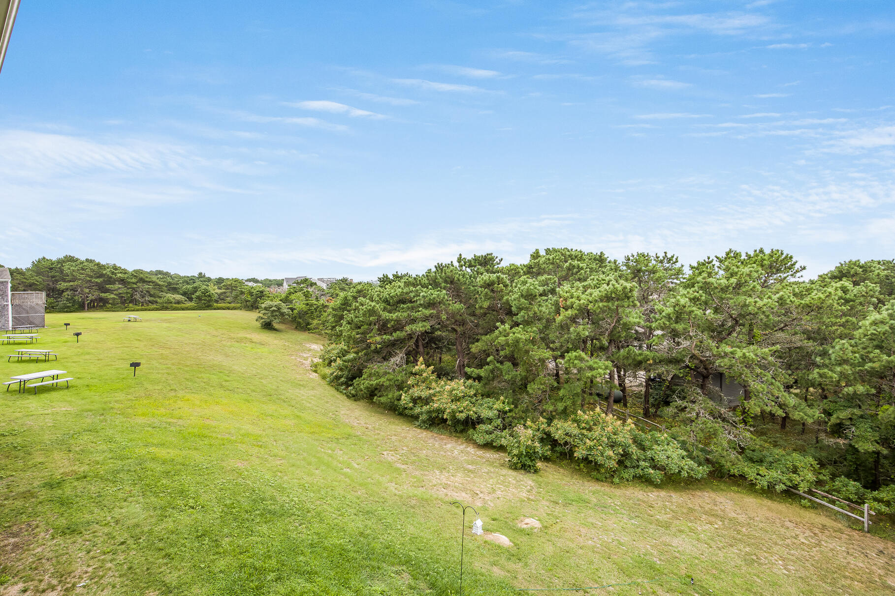 132 Shore Road, Unit 30 Truro, MA 02666 - Photo 23 of 32 a view of a lake with a yard